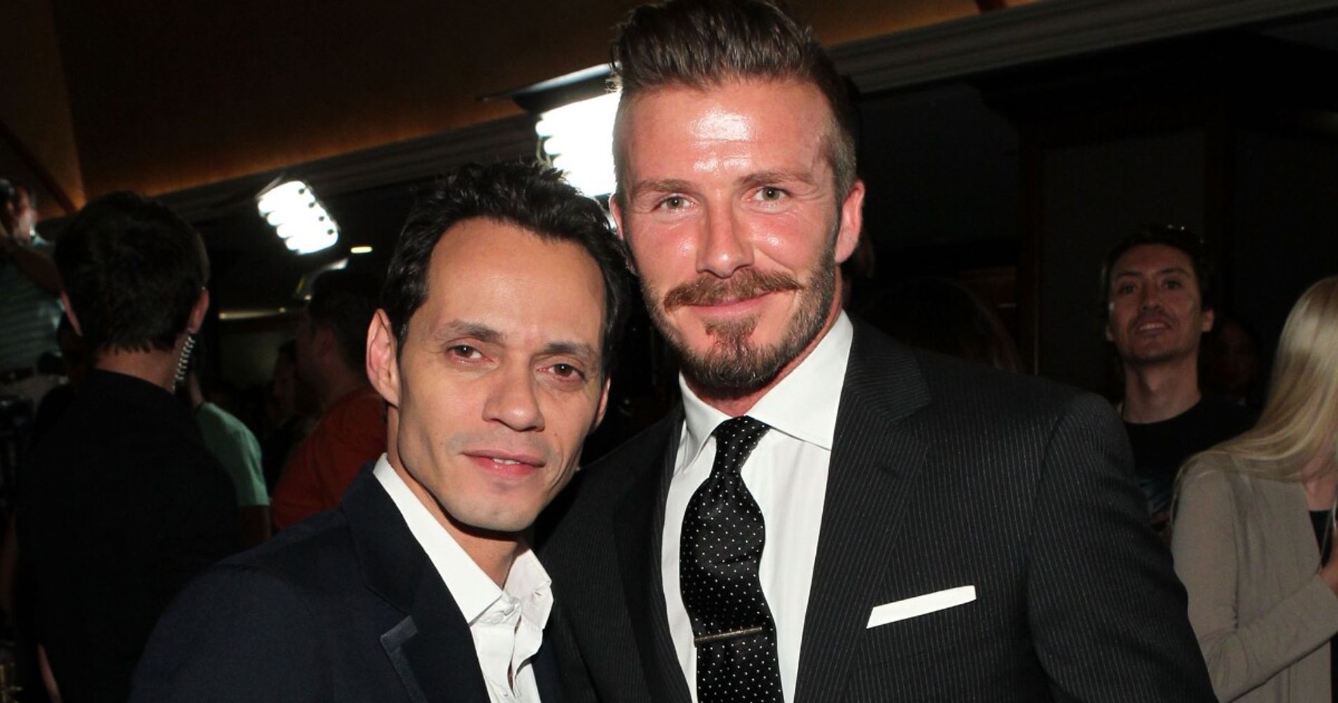 Marc Anthony junto a David Beckham.