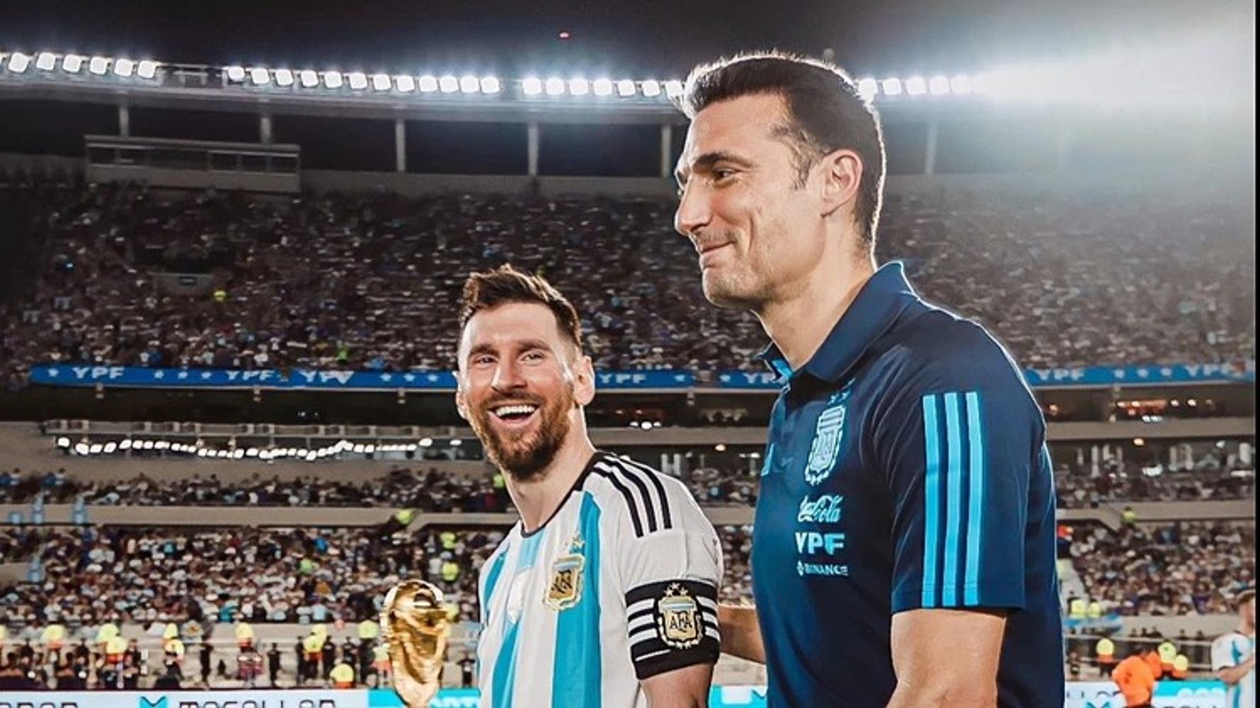 Messi y Scaloni.