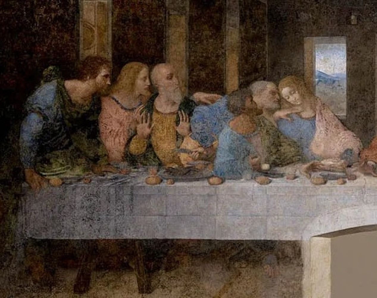 La última cena: Andrés, niega ser él; Judas apenas se identifica; y Juan parece abatido.