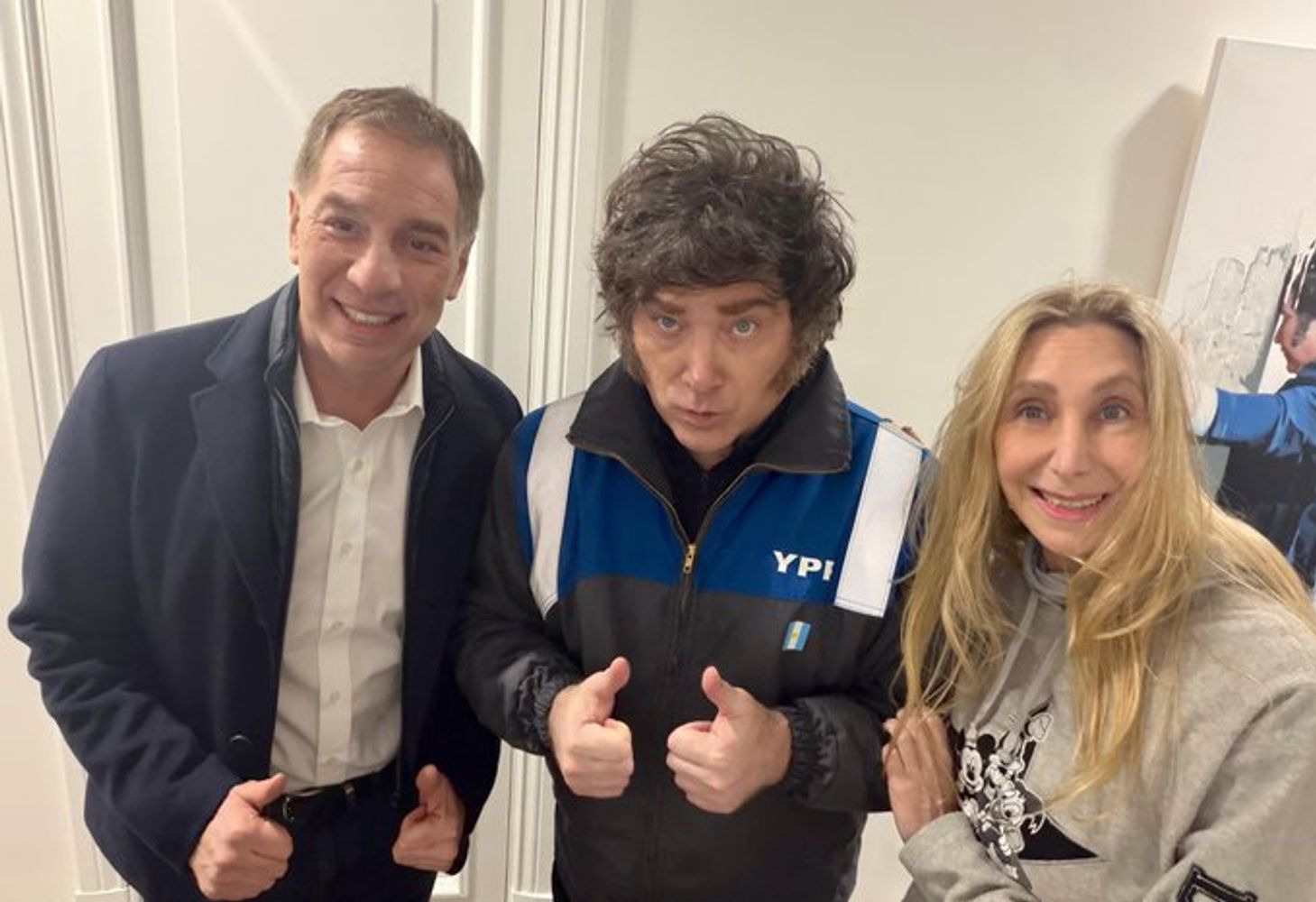 Javier Milei junto a su hermana Karina, y el nuevo jefe de Gabinete, Diego Santilli.