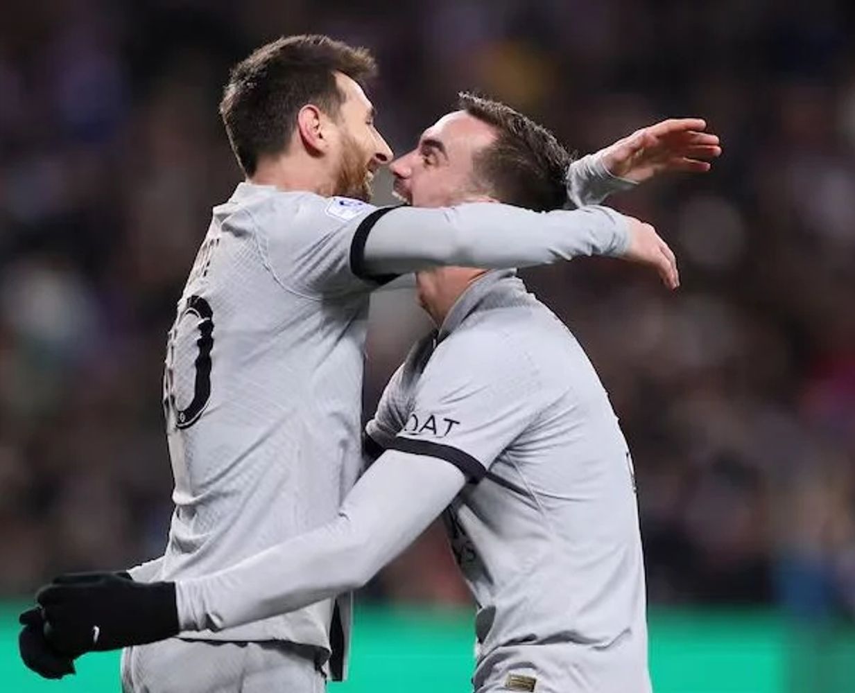 Marc Cucurella y Lionel Messi