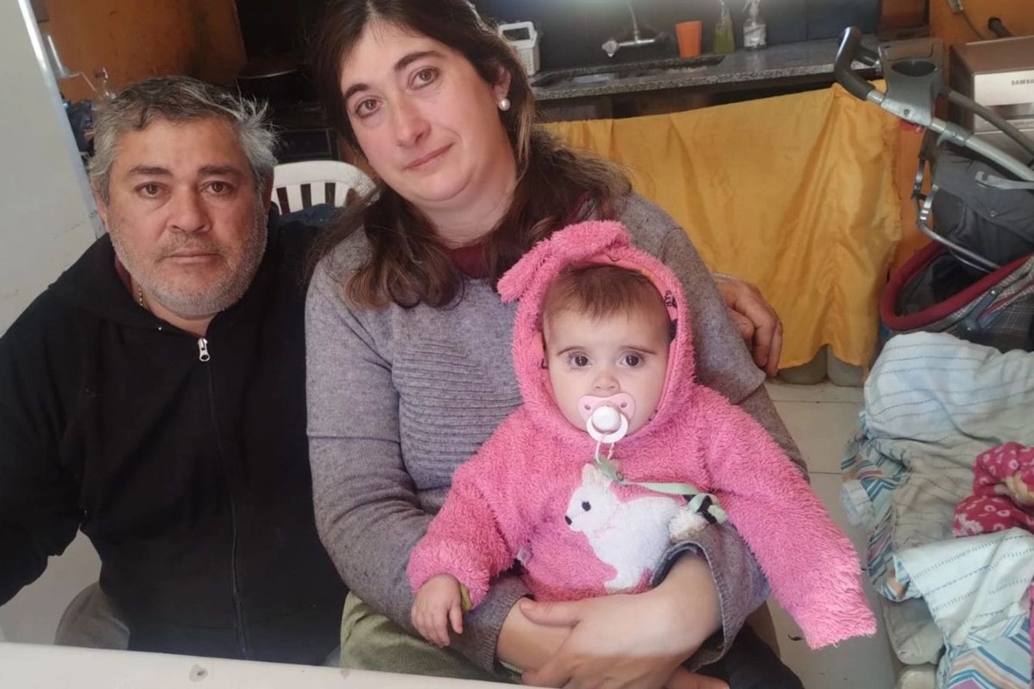 Emma y sus padres.