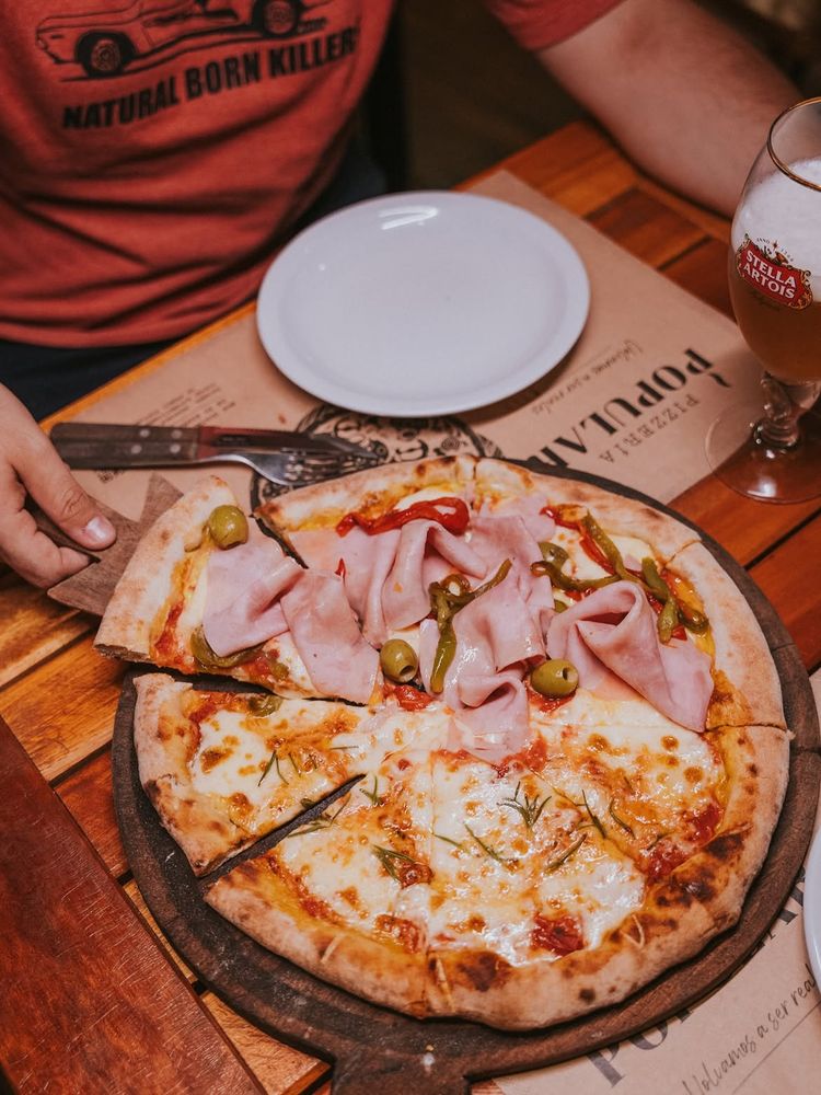 Pizzería Popular nació en Córdoba y se expande por el país y el mundo.