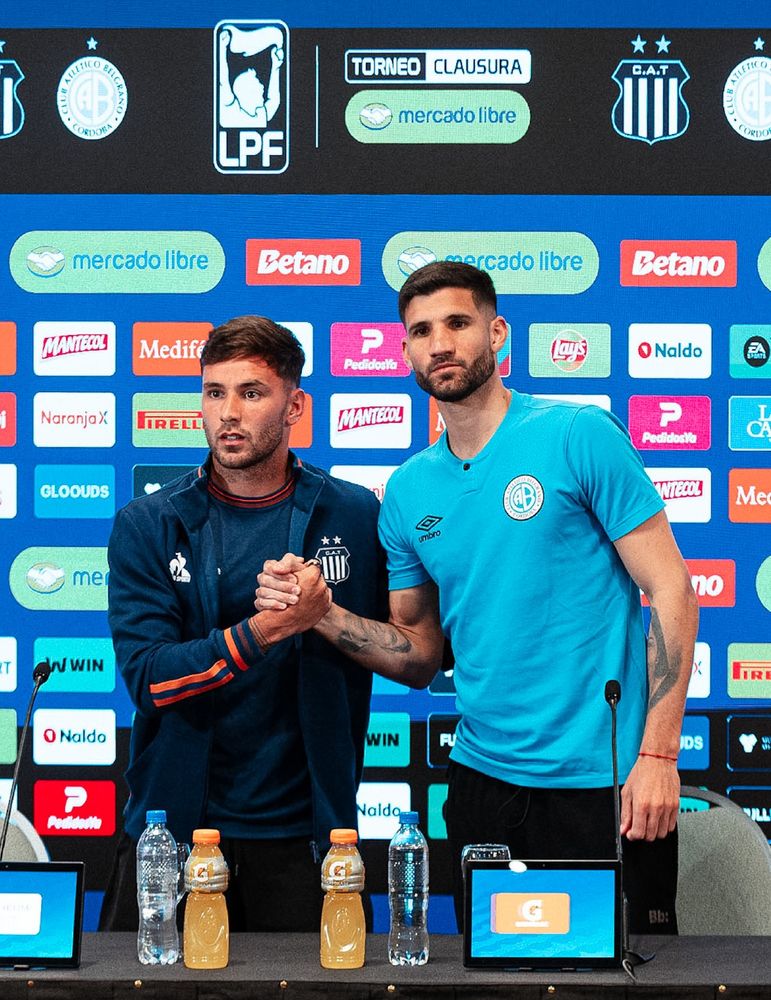 Agusto Schott y Lisandro López, por el Talleres-Belgrano.
