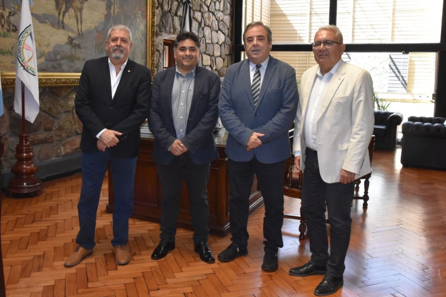 Guido Luna, Luciano Moreira, Alberto Bernis y Julio Bravo se reunieron en el despacho de Presidencia de la Legislatura para conversar sobre el proyecto oficial de una nueva Ley de Coparticipación Municipal.