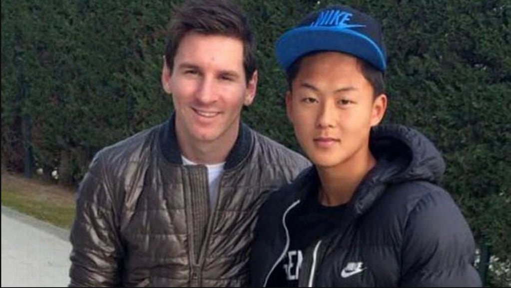 Lee Seung-Woo y Lionel Messi