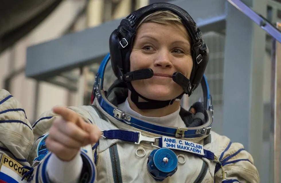 (FILES) In this file photo taken on November 14, 2018 NASA astronaut Anne McClain, a member of the International Space Station (ISS) expedition 58/59, attends her final exam at the Gagarin Cosmonauts' Training Centre in Star City outside Moscow. - US space agency NASA is investigating what may be the first crime committed in outer space, The New York Times reported on August 24, 2019. Astronaut Anne McClain is accused of identity theft and improperly accessing her estranged wife's private financial records while on a sixth-month mission aboard the International Space Station (ISS), the Times said. (Photo by STR / AFP)