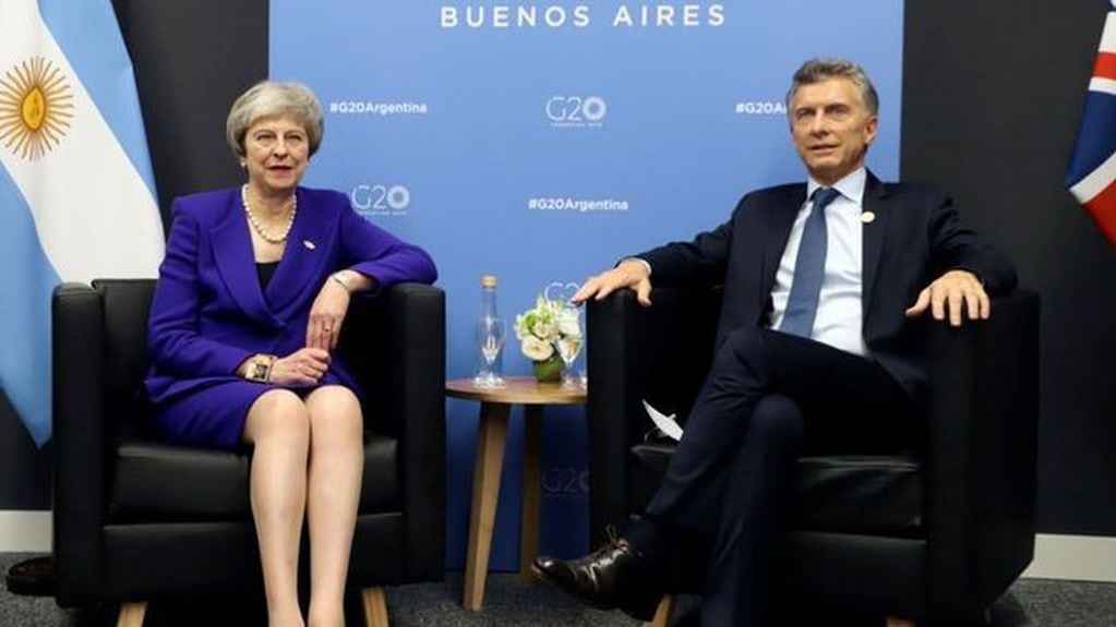 La ex primer ministro del Reino Unido, Theresa May, junto al presidente Mauricio Macri