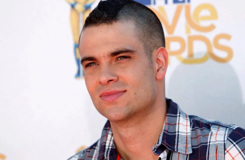 FILE PHOTO: Actor Mark Salling from the television show 'Glee' arrives at the 2010 MTV Movie Awards in Los Angeles, California, U.S. June 6, 2010.  REUTERS/Danny Moloshok/File Photo