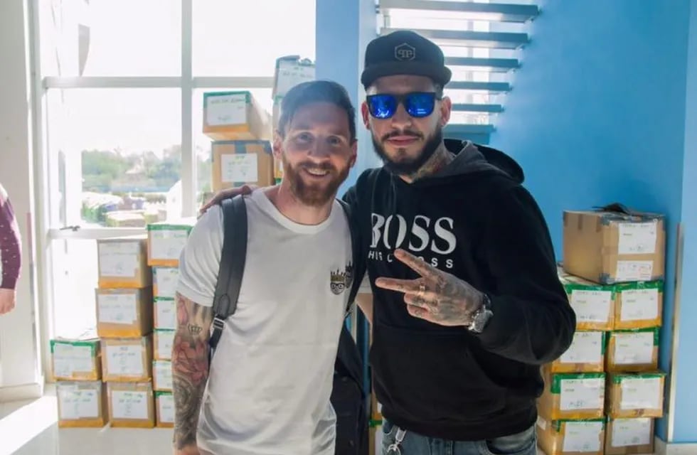 Messi y Ulises Bueno.