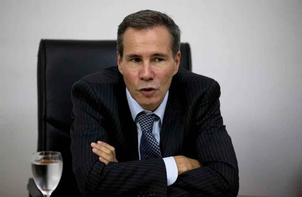FILE - In this May 29, 2013 file photo, Alberto Nisman, the prosecutor investigating the 1994 bombing of the Argentine-Israeli Mutual Association community center, talks to journalists in Buenos Aires, Argentina. The country's top criminal tribunal on Thu