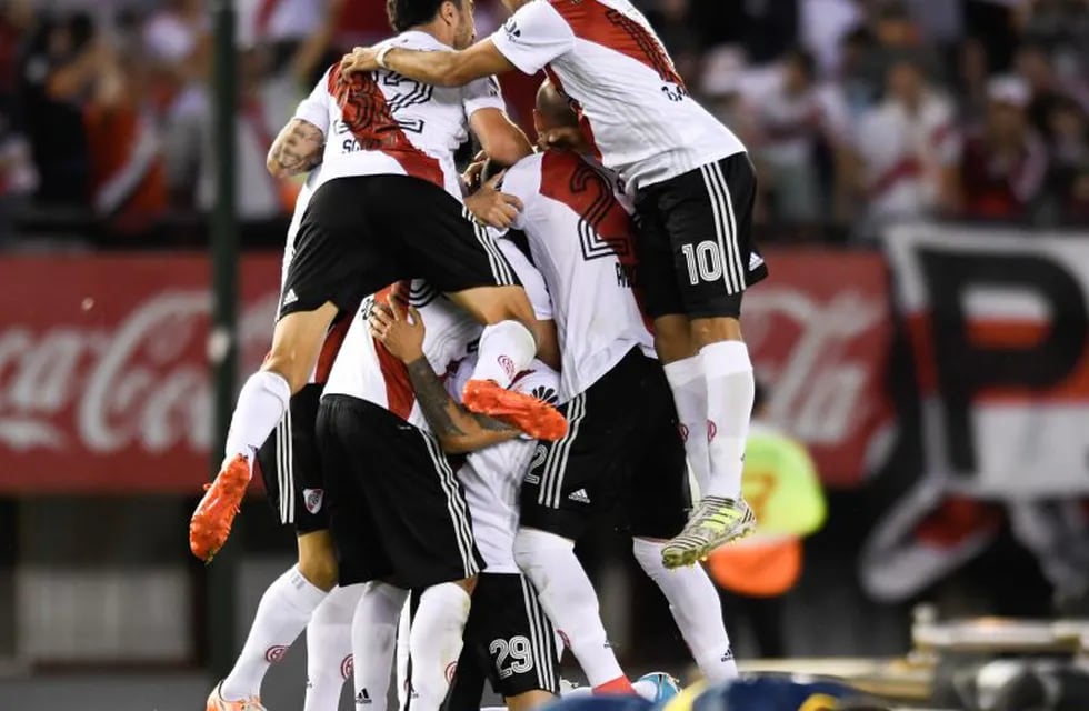 River Plate's players celebrates after scoring their side's goal against Boca Juniors during local tournament soccer match in Buenos Aires, Argentina, Sunday, November 5, 2017. (AP Photo/Gustavo Garello)
