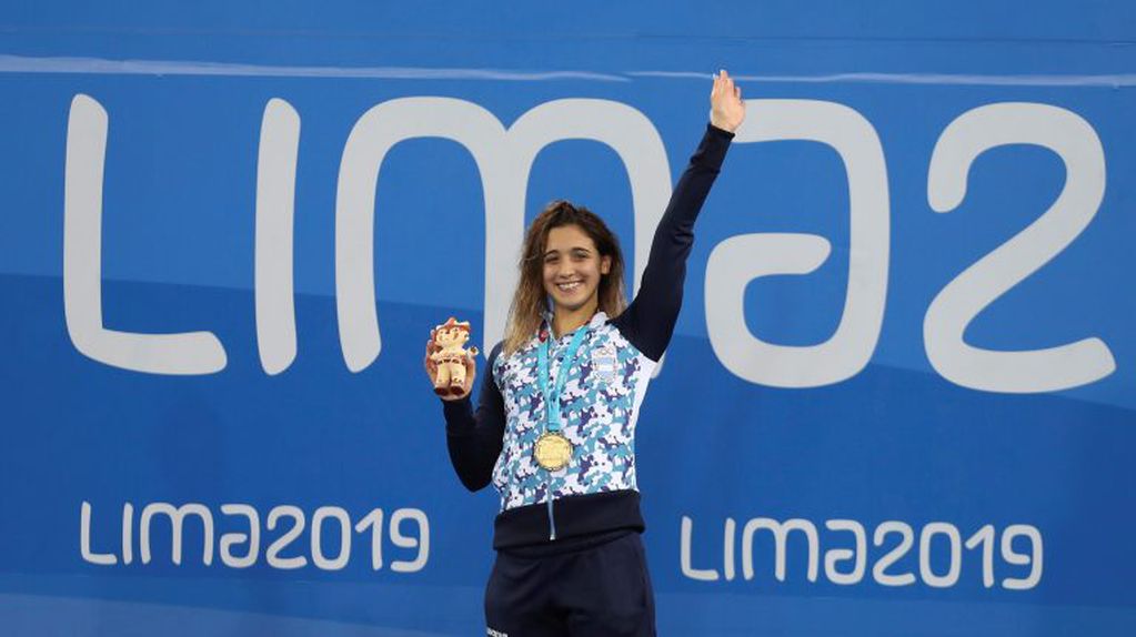 La nadadora argentina Delfina Pignatiello se trajo tres medallas de oro de Lima 2019 (AP/Fernando Vergara)
