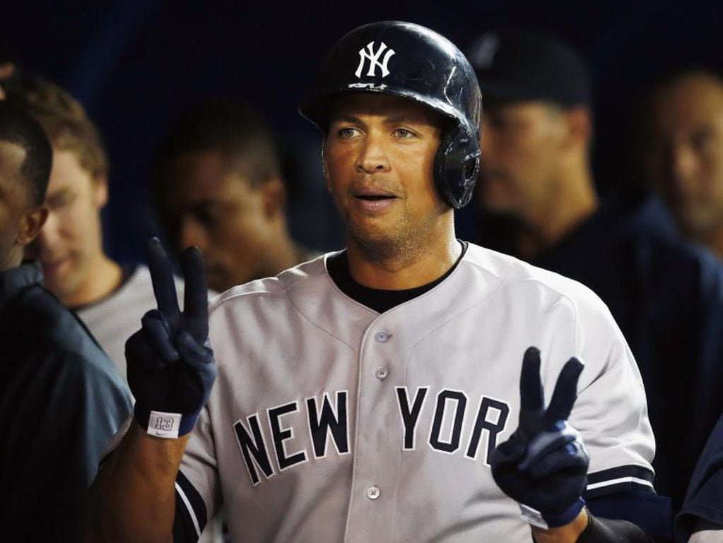 New York Yankees Alex Rodriguez celebrates his home run against the Toronto Blue Jays during the fifth inning of their MLB American League baseball game in Toronto in this August 26, 2013 file photo. Rodriguez will be suspended for the entire 2014 Major L