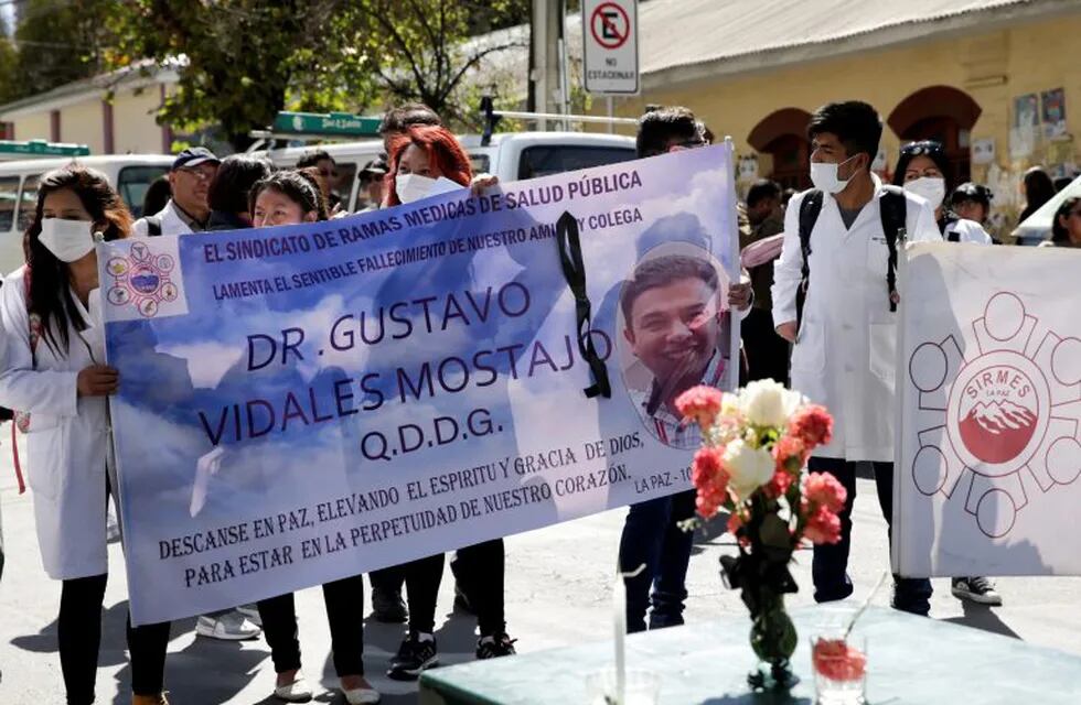 Doctors and health employees attend a mass in memory of two doctors who died after contracting arenavirus, in La Paz, Bolivia July 12, 2019. REUTERS/David Mercado
