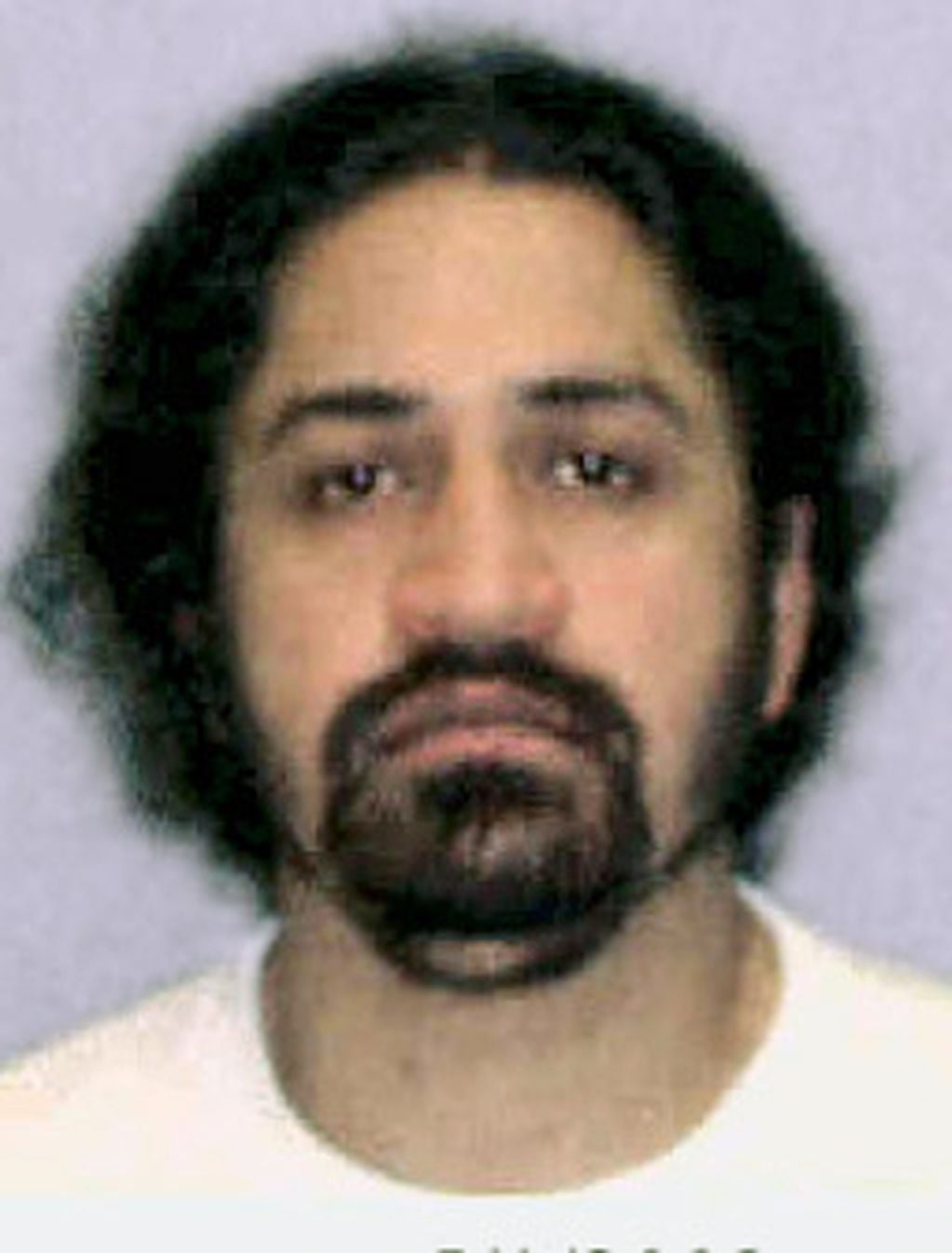 Iyman Faris, 34, is shown in this photo made available by the U.S. Justice Department. The Senate Intelligence Committee’s report on the CIA program that included torturing al-Qaida detainees provides eight “primary” examples in which the CIA said it obtained good intelligence as a result of what it called “enhanced interrogation techniques” and the Senate panel’s conclusions that the information was available elsewhere and without resorting to brutal interrogations. The CIA said the brutal interrogation of Khalid Sheikh Mohammed identified an Ohio truck driver, Iyman Faris, who later pleaded guilty to terrorism charges. (AP Photo/Dept. of Justice)  Iyman Faris terrorista de al qaeda capturado gracias a los interrogatorios bajo tortura de la cia terrorismo terroristas al qaeda