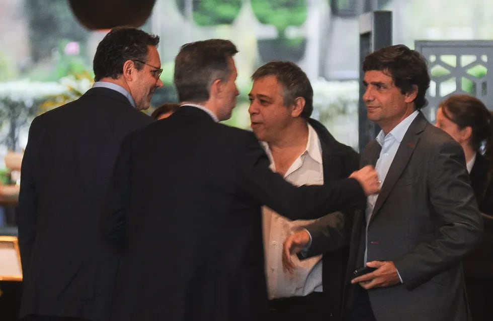 Los econimistas Guido Sandleris, Martín Rapetti y Hernan Lacunza. (Federico Lopez Claro)