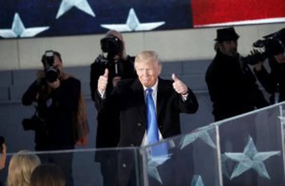 U.S. President-elect Donald Trump gives a thumbs-up at the 