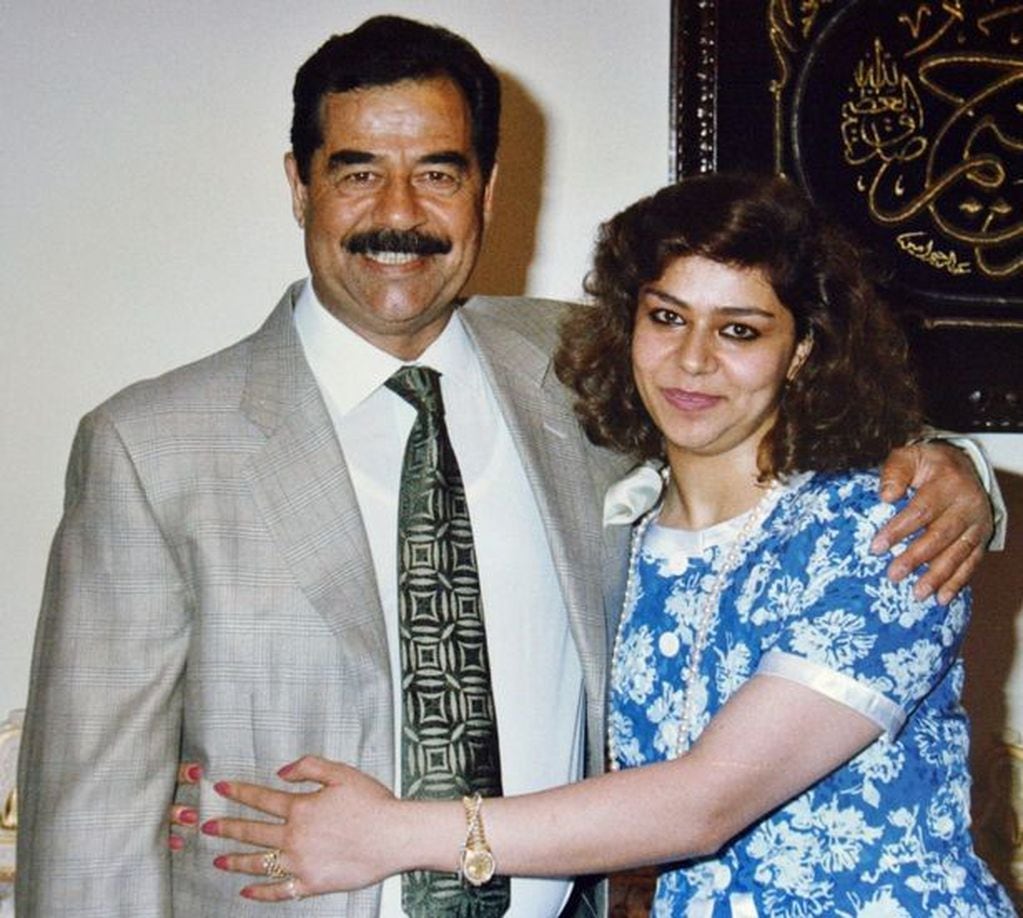 Saddam Hussein junto a su hija Raghad