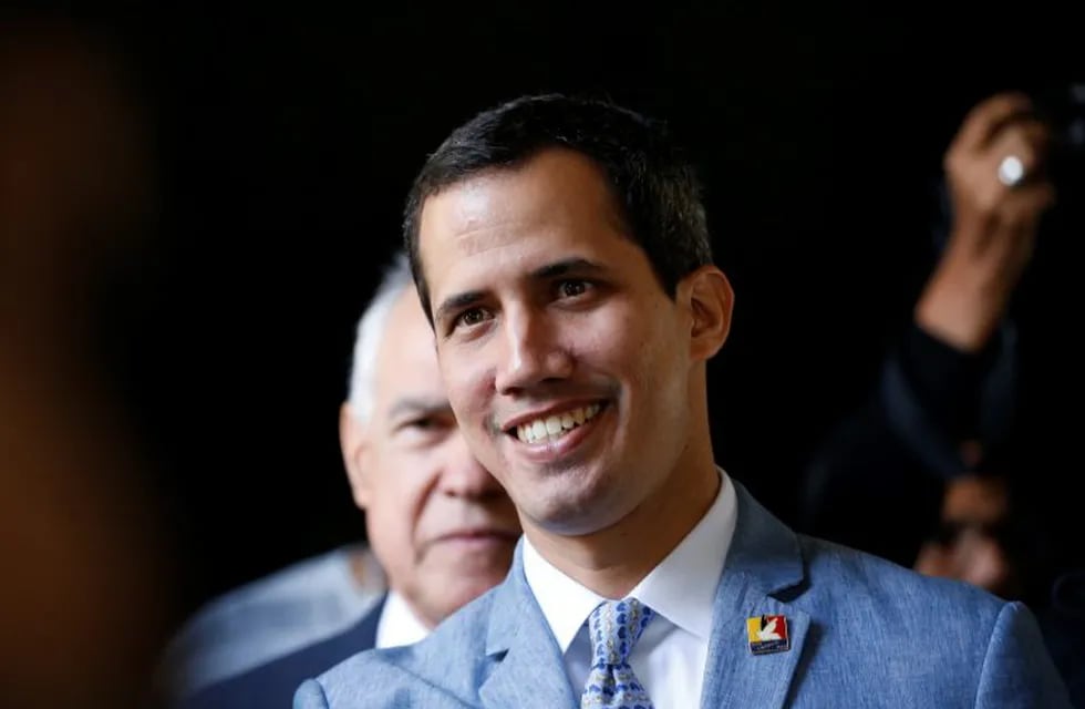 Venezuela's self proclaimed president Juan Guaido arrives for a meet with university students at the Central University of Venezuela, in Caracas, Venezuela, Friday, Feb. 9, 2019. Guaido declared himself interim president in Venezuela, a move recognized by several dozen countries, but President Nicolas Maduro is refusing to relinquish power. (AP Photo/Ariana Cubillos)