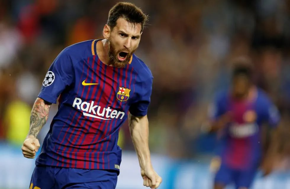 Lionel Messi celebra uno de sus 37 goles con los que se hizo acreedor de una nueva Bota de Oro para sus vitrinas. (AP Photo/Francisco Seco)