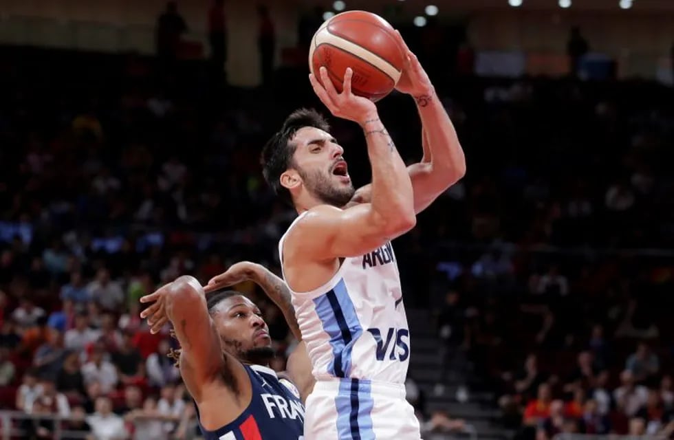 Basketball - FIBA World Cup - Semi Finals - Argentina v France - Wukesong Sport Arena, Beijing, China - September 13, 2019 Argentina's Facundo Campazzo in action with France's Andrew Albicy REUTERS/Jason Lee