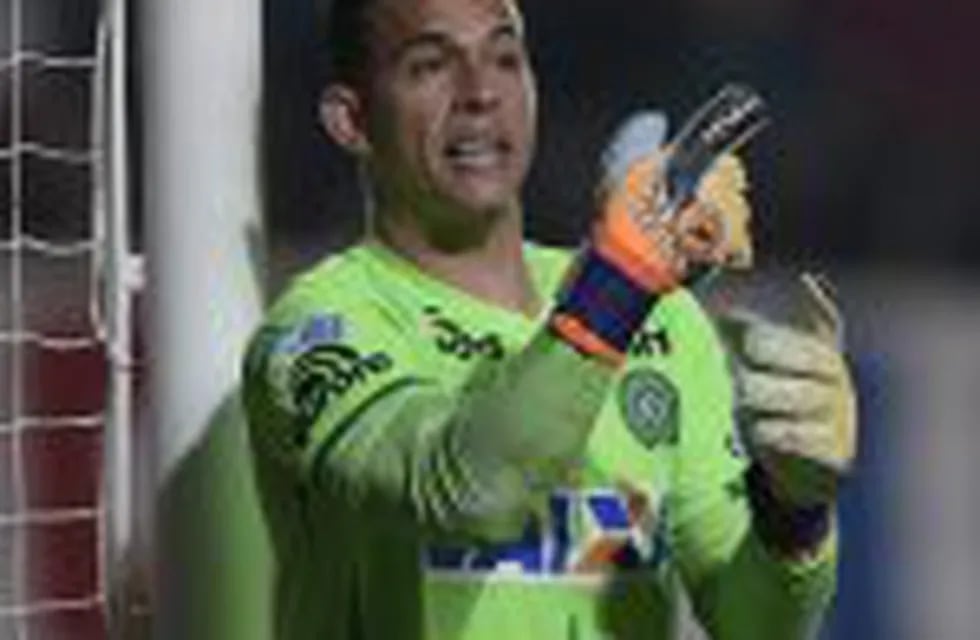 (FILES) This file photo taken on November 2, 2016 shows Brazil's Chapecoense goalkeeper Danilo gesturing during the Copa Sudamericana semifinal first leg football match, against Argentina's San Lorenzo at Pedro Bidegain stadium in Buenos Aires.nA plane carrying 81 people, including members of a Brazilian football team, crashed late on November 28, 2016 near the Colombian city of Medellin, officials said. The survivors, two crew members and three players of Chapecoense Real Alan Ruschel, goalkeeper Danilo and Jackson Follman were transferred to local hospitals, according to radio Caracol. / AFP PHOTO / JUAN MABROMATA