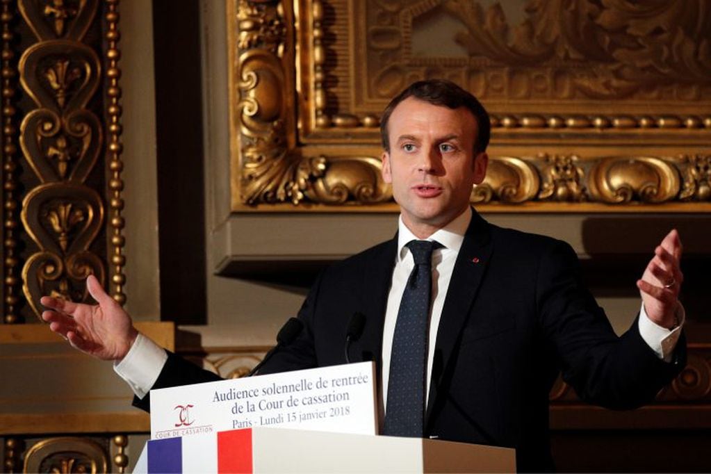 FILE - In this Monday, Jan. 15, 2018 file photo, French president Emmanuel Macron delivers his speech during a ceremony at The Cour de Cassation, France's highest judicial court, at the Paris courthouse, in Paris. French President Emmanuel Macron told the BBC in an interview broadcast Sunday Jan. 21, 2018, he shared the outrage of many African countries in response to President Donald Trump’s disparaging comments about the continent. (AP Photo/Francois Mori, pool, file)