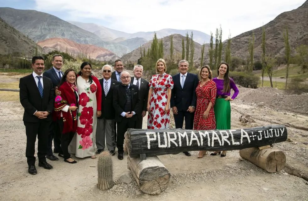 Ivanka Trump, assistant to President Donald Trump, center right, stands for a group photograph near the Mountain of Seven Colors in Purmamarca, Jujuy province, Argentina, on Thursday, Sept. 5, 2019. Ivanka Trump visited a migrant camp in Colombia on Wednesday as part of an official U.S. delegation, as Washington boosts humanitarian assistance for the millions of people who have fled Venezuela's collapsing economy. Photographer: Al Drago/Bloomberg