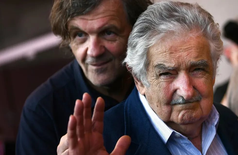 director Emir Kusturica (L) and former President of Uruguay Jose \