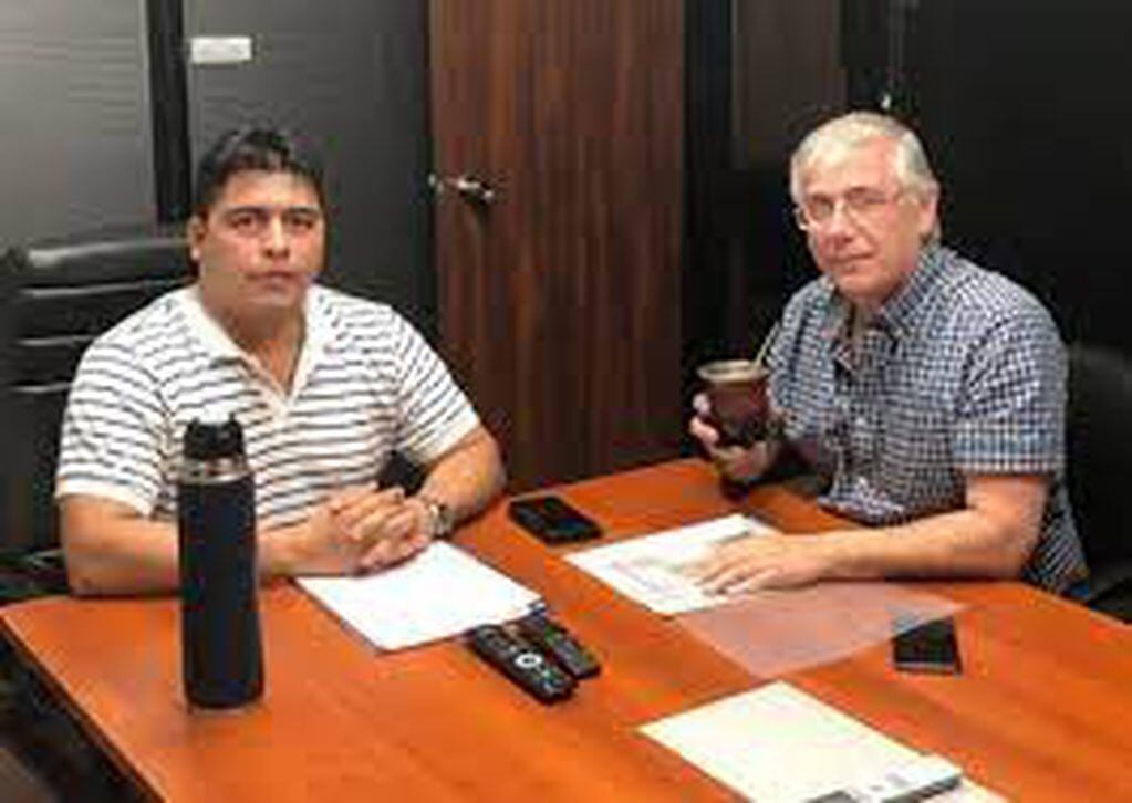 Julio Gutiérrez (CGT) y Claudio Vidal (Petroleros Privados).