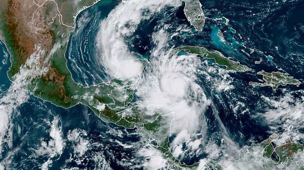 This RAMMB/NOAA satellite image shows Hurricane Delta moving northwest in the Caribbean on October 6, 2020, at 15:20 UTC. - Hurricane Delta intensified rapidly into a Category 4 storm on October 6, 2020 and is set to slam into Mexico's Yucatan Peninsula early on October 7, 2020, the US National Hurricane Center said. Maximum sustained winds increased to 130 miles (215 kilometers) per hour, and the storm is \