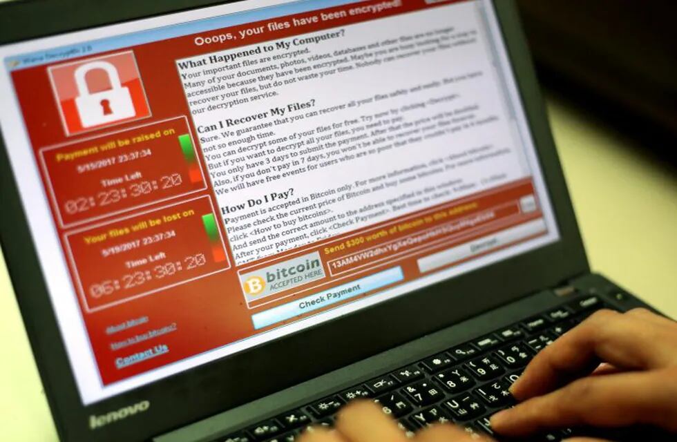 RIT01. Taipei (Taiwan), 12/05/2017.- A programer shows a sample of a ransomware cyberattack on a laptop in Taipei, Taiwan, 13 May, 2017. According to news reports, a 'WannaCry' ransomware cyber attack hits thousands of computers in 99 countries encrypting files from affected computer units and demanding 300 US dollars through bitcoin to decrypt the files. (Atentado, Estados Unidos) EFE/EPA/RITCHIE B. TONGO