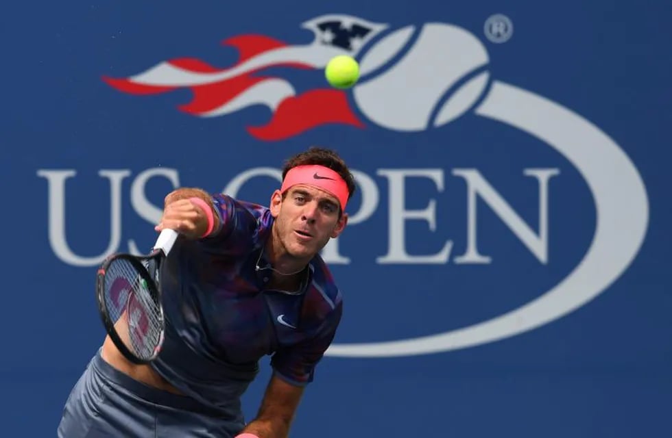 Juan Martin del Potro of Argentina serves the ball to Spain's Adrian Menendez-Maceiras during their men's Singles match during their US Open 2017 at the USTA Billie Jean King National Tennis Center on August 31, 2017 in New York. / AFP PHOTO / TIMOTHY A. CLARY