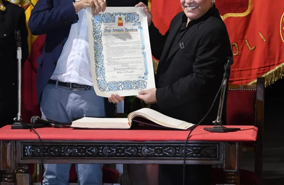 Argentinian former soccer player Diego Maradona receives the honorary citizenship of Naples by the mayor Luigi De Magistris (L) in Naples, Italy, 05 July 2017. Maradona will receive the honorary citizenship of Naples on 05 July 2017.\nANSA/CIRO FUSCO