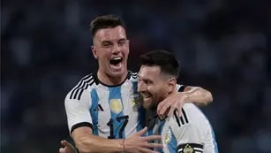 Giovani Lo Celso y Lionel Messi