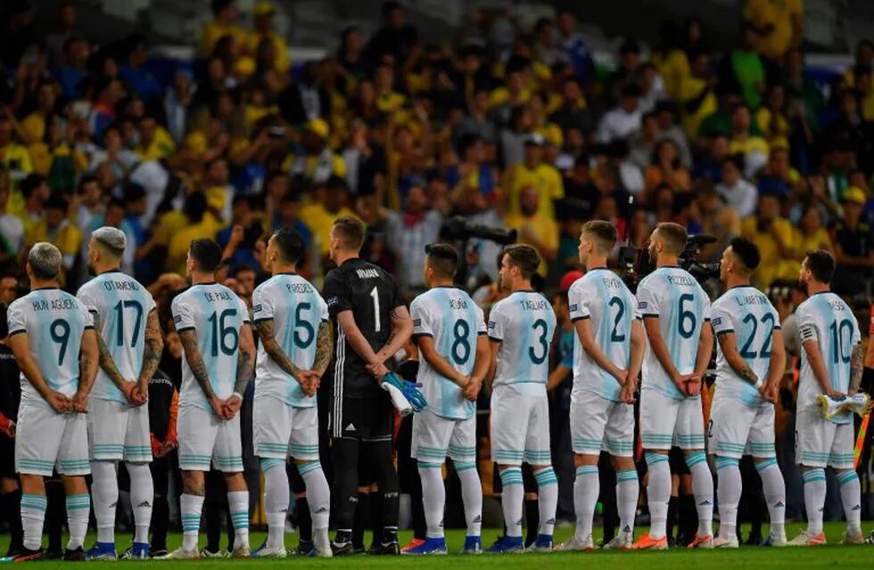 Players of Argentina listen to the national anthems before their Copa America football tournament semi-final match against Brazil at the Mineirao Stadium in Belo Horizonte, Brazil, on July 2, 2019. (Photo by Pedro UGARTE / AFP)