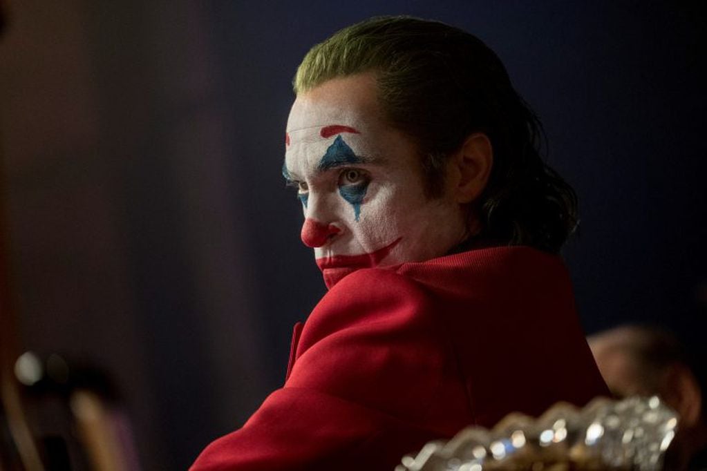 This image released by Warner Bros. Pictures shows Joaquin Phoenix in a scene from the film "Joker." (Niko Tavernise/Warner Bros. Pictures via AP)