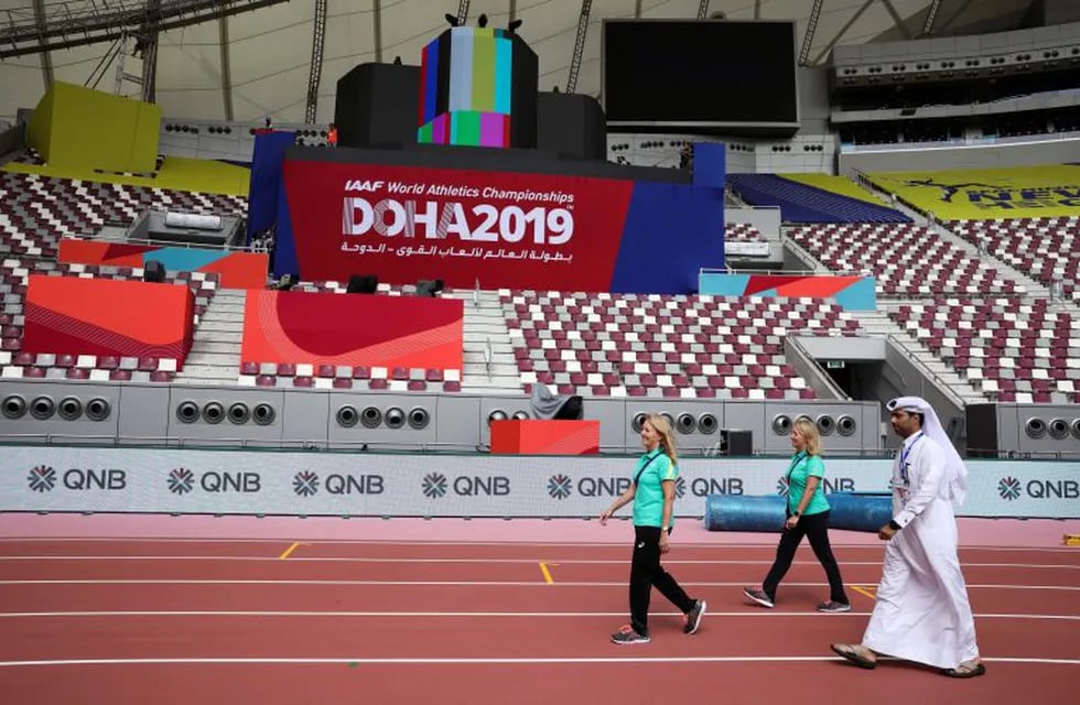 Doha (Qatar), 26/09/2019.- Officials walk in the Khalifa International Stadium in Doha, Qatar, 26 September 2019. The IAAF World Athletics Championships 2019 are taking place at the Khalifa Stadium in Doha from 27 September until 06 October 2019. (Mundial de Atletismo, Catar) EFE/EPA/YAHYA ARHAB