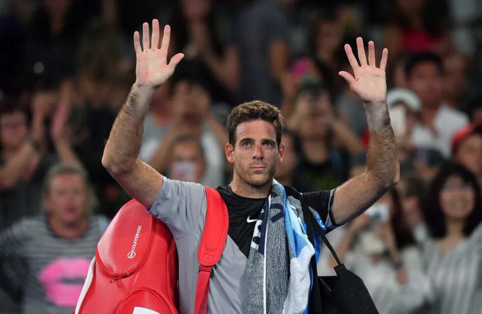 Argentina's Juan Martin del Potro waves to the crowd as he leaves the court following his third round loss to Tomas Berdych of the Czech Republic at the Australian Open tennis championships in Melbourne, Australia, Saturday, Jan. 20, 2018. (AP Photo/Andy Brownbill)