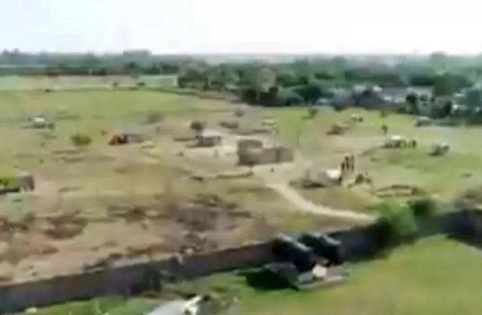 Desalojan terrenos usurpados en Córdoba (imagen de TV)