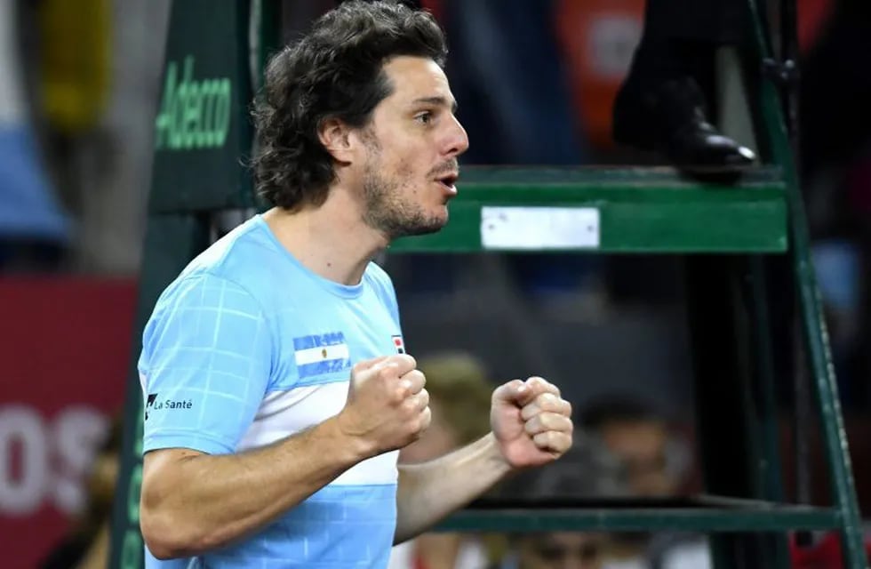 Argentina's team captain Gaston Gaudio celebrates a point in the doubles tennis match of the Davis Cup World Group play off series against Colombia's   at the Aldo Cantoni stadium in San Juan, Argentina, on September 15, 2018. (Photo by Andres Larrovere / AFP) san juan gaston gaudio campeonato torneo copa davis 2018 tenis partido dobles partido tenistas equipo argentina colombia