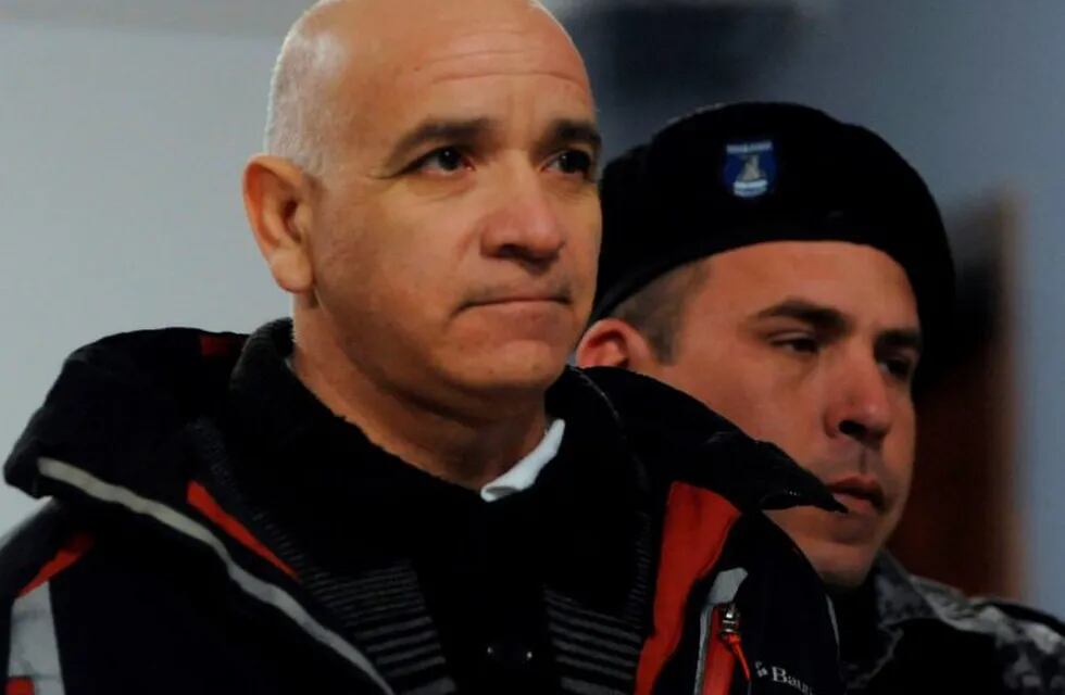 Former gardener Armando Gomez is escorted as he leaves a courtroom after the beginning of his trial over allegations of sexual abuse in Mendoza, Argentina, on August 5, 2019. - Italian Catholic priest Nicola Corradi, Argentinian Catholic priest Horacio Corbacho and Gomez were accused of sexually abusing children at the Antonio Provolo Institute, dedicated to the education of deaf children in Mendoza. (Photo by Andres Larrovere / AFP)