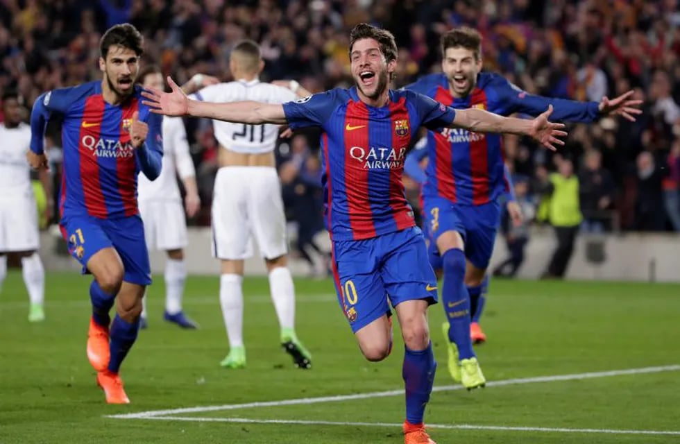 Barcelona's Sergi Roberto celebrates after scoring the sixth goal during the Champions League round of 16, second leg soccer match between FC Barcelona and Paris Saint Germain at the Camp Nou stadium in Barcelona, Spain, Wednesday March 8, 2017. Barcelona
