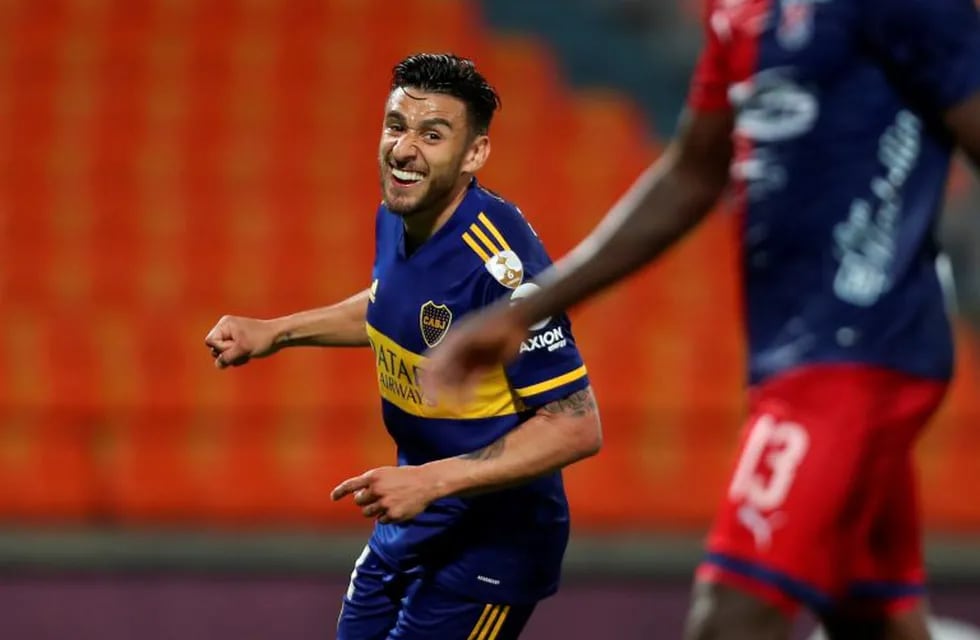 Argentina's Boca Juniors Eduardo Salvio celebrates after scoring against Colombia's Independiente Medellin during the closed-door Copa Libertadores group phase football match at the Atanasio Girardot Stadium in Medellin, Colombia, on September 24, 2020, amid the COVID-19 novel coronavirus pandemic. (Photo by Fernando Vergara / POOL / AFP)