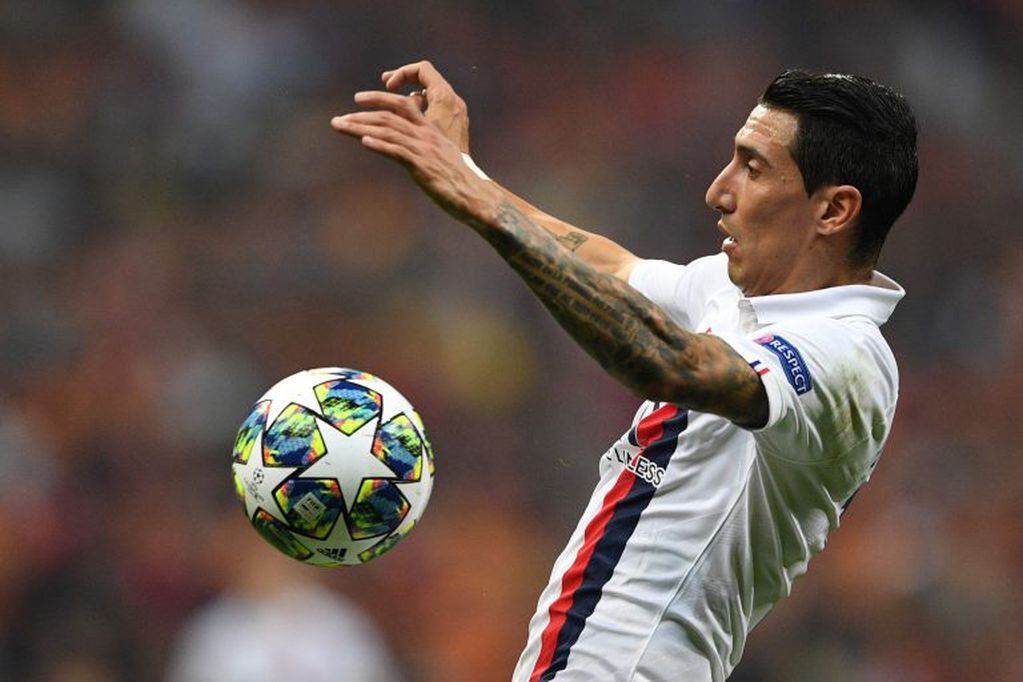 Di María confesó que llegó a llorar por Messi. (Photo by Bulent Kilic / AFP)