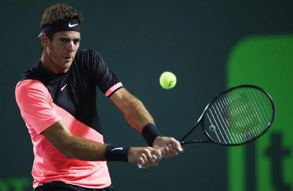 KEY BISCAYNE, FL - MARCH 23: Juan Martin Del Potro of Argentina plays a backhand against Robin Haase of the Netherlands in their second round match during the Miami Open Presented by Itau at Crandon Park Tennis Center on March 23, 2018 in Key Biscayne, Florida.   Clive Brunskill/Getty Images/AFP\n== FOR NEWSPAPERS, INTERNET, TELCOS & TELEVISION USE ONLY ==
