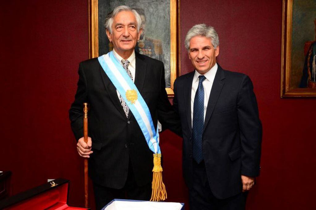 Alberto Rodríguez Saá y Claudio Poggi en el traspaso de mando.