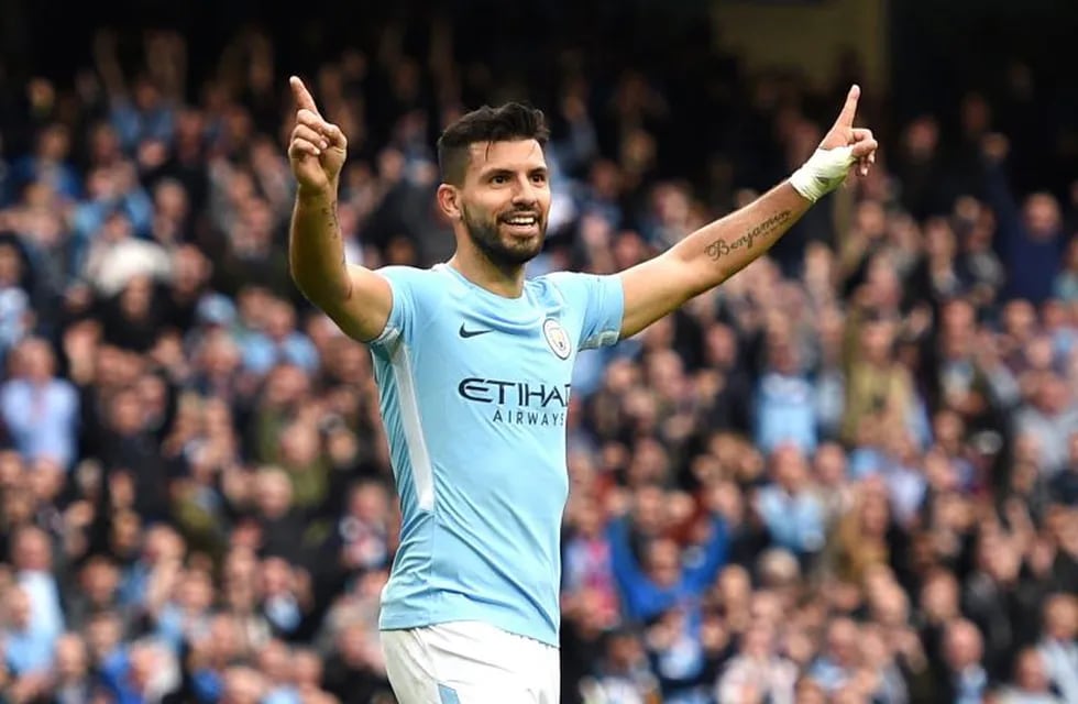 Manchester City's Argentinian striker Sergio Aguero celebrates after scoring their fourth goal during the English Premier League football match between Manchester City and Crystal Palace at the Etihad Stadium in Manchester, north west England, on September 23, 2017. / AFP PHOTO / Oli SCARFF / RESTRICTED TO EDITORIAL USE. No use with unauthorized audio, video, data, fixture lists, club/league logos or 'live' services. Online in-match use limited to 75 images, no video emulation. No use in betting, games or single club/league/player publications.  /