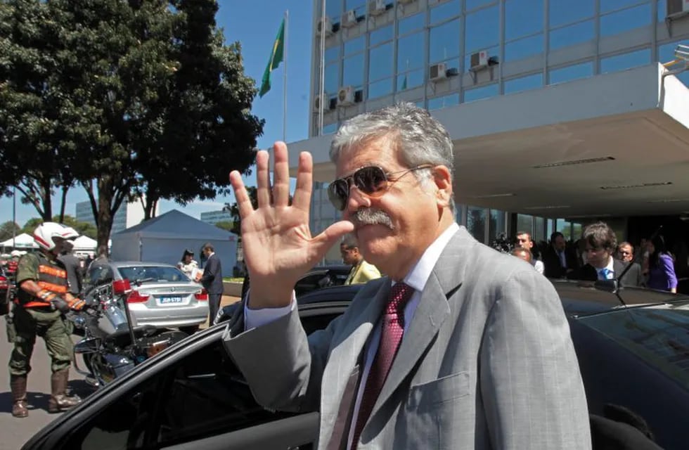 FILE- In this April 20, 2012 file photo, Argentina's then Planning Minister Julio de Vido waves to media as he leaves the Ministry of Mines and Energy in Brasilia, Brazil. Argentina's Congress is considering stripping De Vido of his immunity as current legislator, since he is being accused of corruption. (AP Photo/Eraldo Peres) ciudad de buenos aires julio de vido detencion del ex ministro de planificacion federal en los tribunales de comodoro py investigacion corrupcion